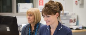 Nurse at Reception Desk