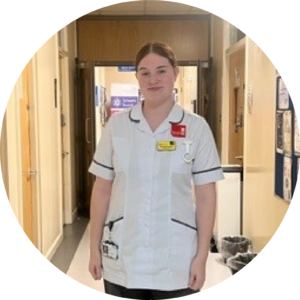 Image of VtC candidate now in their Staffordshire University training nurse uniform.