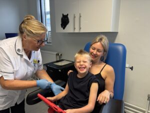 George Allport with his mum Rheanna Allport set for a blood test