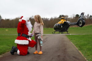 Juno Robertshaw, 6, meets Santa