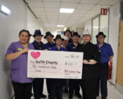 PRH Catering team presenting a cheque to the Dementia team.