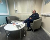 Image of Karen, Professional Nurse Advocate with the table and chairs purchased by SaTH Charity